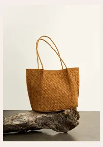 Brown suede woven shoulder tote bag, large capacity handmade casual armpit bag for women.