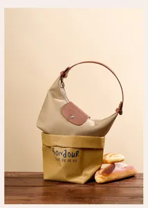 Stylish nylon dumpling shoulder bag, casual commuter handbag and versatile everyday tote.