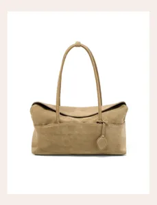 Detailed view of the vintage khaki suede shoulder bag, featuring soft texture and stylish design.