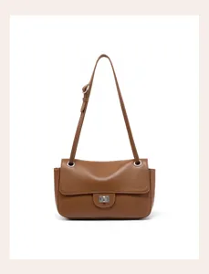 Stylish genuine leather brown shoulder bag for women, elegant underarm style with metal lock.