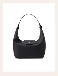 Black nylon hobo shoulder bag detail, stylish casual handbag featuring a secure leather flap.
