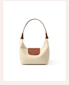 Beige nylon hobo shoulder bag with brown leather handle and flap casual daily commute bag