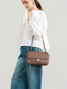 Chic genuine leather shoulder bag for women, stylish brown commuter crossbody flap bag.