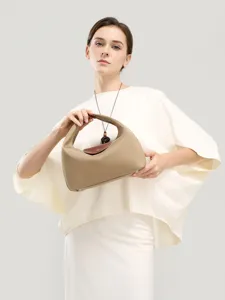 Classic nylon dumpling handbag for women, casual commuter underarm bag with top handle.