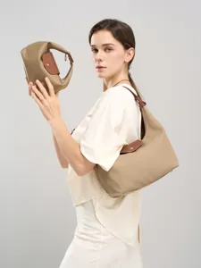 Khaki nylon shoulder bag, classic dumpling handbag, stylish commuter underarm bag for women.