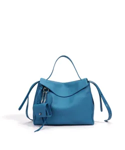 Blue leather shoulder bag for women, stylish commuting crossbody bag with chic charm and details.