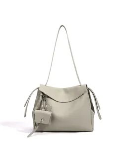 Grey leather shoulder bag for women, large capacity commuter crossbody bag with stylish mini charm.