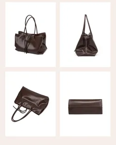 Detail view of vintage brown genuine leather tote bag, showing multiple angles and fine texture.