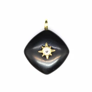 Black rhombus crystal pendant necklace with gold sunburst detail elegant jewelry piece.
