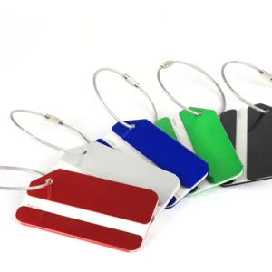 Aluminum metal luggage tag detail view showing multi-color options with steel wire loops.
