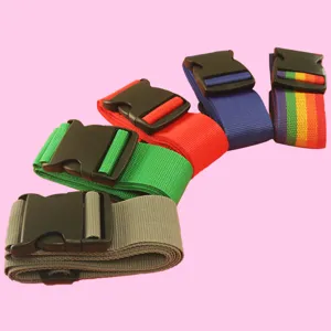 Adjustable luggage straps with sturdy plastic buckles, secure packing belt for travel suitcase.