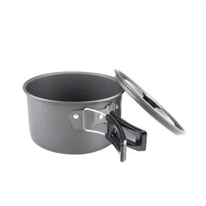 Outdoor camping teapot pot with folding handles, portable aluminum oxide cookware detail view.