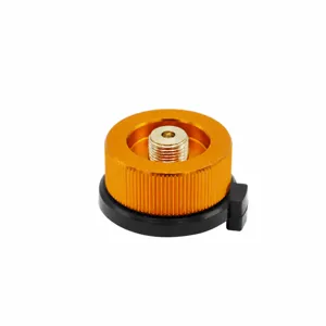Portable camping gas canister adapter, lightweight metal and plastic connector for outdoor stove use.