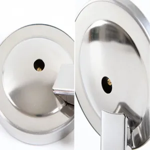 Oven thermometer metal base detail close-up, high quality stainless steel oven accessory.