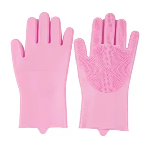 Detailed view of pink silicone dishwashing gloves with dense scrubbing bristles for kitchen cleaning.