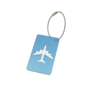 Étiquette de bagage bleue en alliage d'aluminium avec motif d'avion creux et câble en acier.