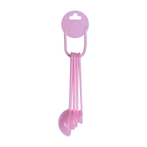 Pink plastic measuring spoons set 5 pieces with hanging ring for kitchen baking use.