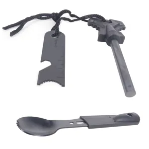 Détail de kit de survie en plein air, allume-feu magnésium avec grattoir multifonction.