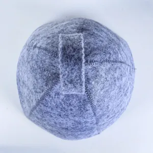 Grey felt sauna hat detail, top hanging loop, thick woolen material for heat insulation.
