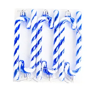Blue and white glitter plastic candy cane ornament detail for Christmas tree holiday decoration.