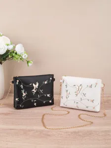 Elegant women's shoulder bag with floral embroidery and chic chain strap for daily wear.