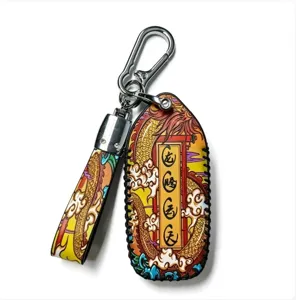 Chinese style dragon pattern car key case with metal hook and strap fob pendant detail.