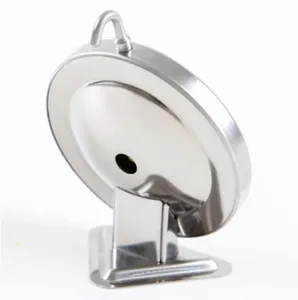 Detailed view of stainless steel oven thermometer, mechanical kitchen baking tool design