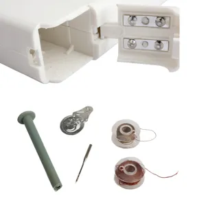 Portable handheld sewing machine replacement parts kit with white body and bobbins.
