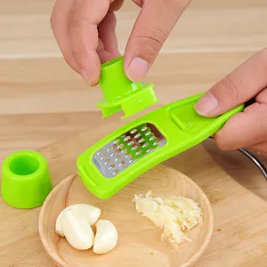 Mini manual garlic press green plastic ginger grater kitchen tool for fast garlic mincing