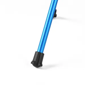 Close-up of blue aluminum camping chair leg with durable non-slip black rubber foot cap.