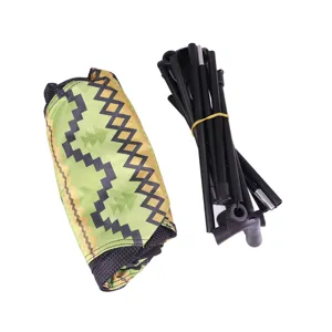 Outdoor folding beach chair parts showing patterned fabric and sturdy black metal frame.