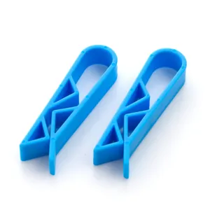 Blue plastic trash bag clips set, non-slip garbage bin rim holders for kitchen use.