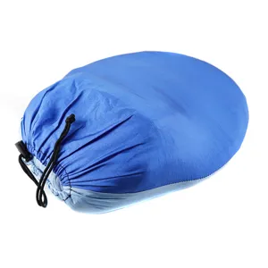 Outdoor camping hammock storage bag detail shot, blue durable fabric with black drawstring.