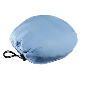 Outdoor portable camping hammock packed in blue lightweight storage bag with black drawstring.