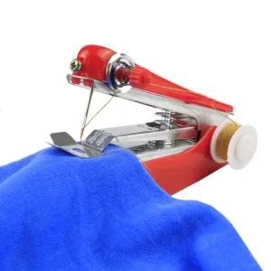 Handheld portable mini sewing machine detail shot featuring compact red metal and plastic body.