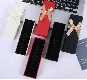 Cajas de regalo largas y elegantes con lazos decorativos ideales para bolígrafos y joyas.