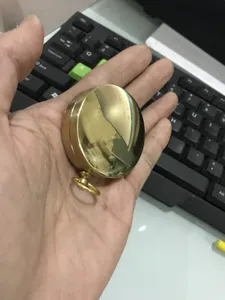 Vintage brass pocket compass, portable outdoor survival navigation tool with loop.