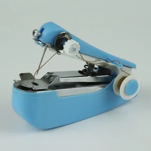 Close-up view of a portable handheld mini sewing machine detail, compact and handy tool.