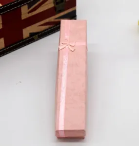 Pink long gift box with ribbon bow, elegant packaging box for necklace and jewelry.