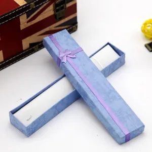 Long blue paper jewelry box with purple ribbon, perfect for necklace and bracelet gift.