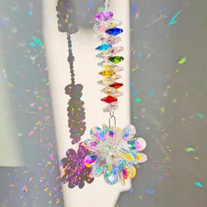 Detailed view of crystal suncatcher casting colorful rainbow light refractions, healing decor.