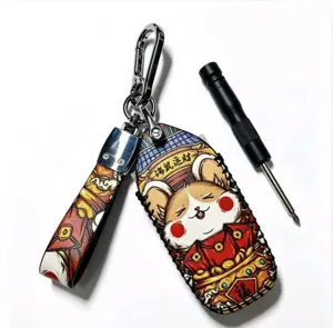 Handmade leather zodiac mouse car key case detail showing exquisite stitching and metal hardware.