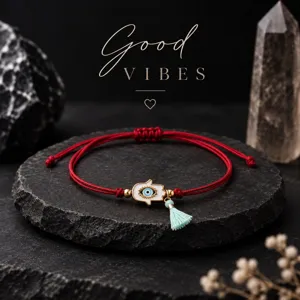 Pulsera ajustable de cuerda roja mano de Hamsa mal de ojo con borla encantadora.