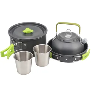 Detailed view of portable camping cookware set including pots, kettle and cups for outdoor use.