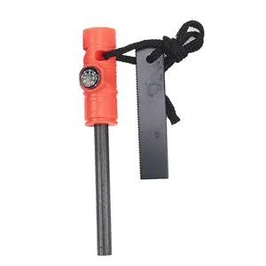 Detailed view of 3-in-1 outdoor survival fire starter with magnesium rod, compass, and scraper.