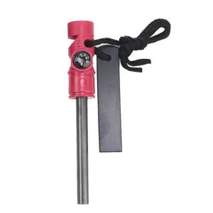 Detailed view of 3-in-1 survival fire starter tool with magnesium rod and compass.