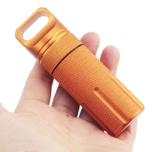 Aluminum waterproof capsule container outdoor survival EDC pill box orange metal storage tank.