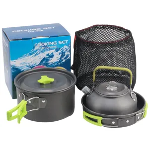 Detailed view of the portable camping cooking set with pots, kettle and mesh bag.