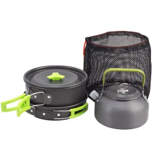 Detail view of portable camping cookware set, showing pot, kettle and mesh storage bag clearly.