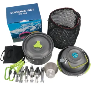 Portable camping cookware set with aluminum pots, kettle, cutlery, and mesh storage bag for outdoor.
